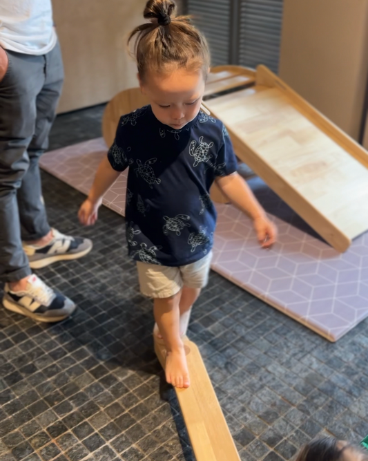 Toddler balancing on Dahan Balance Beams Solid Wood Malaysia