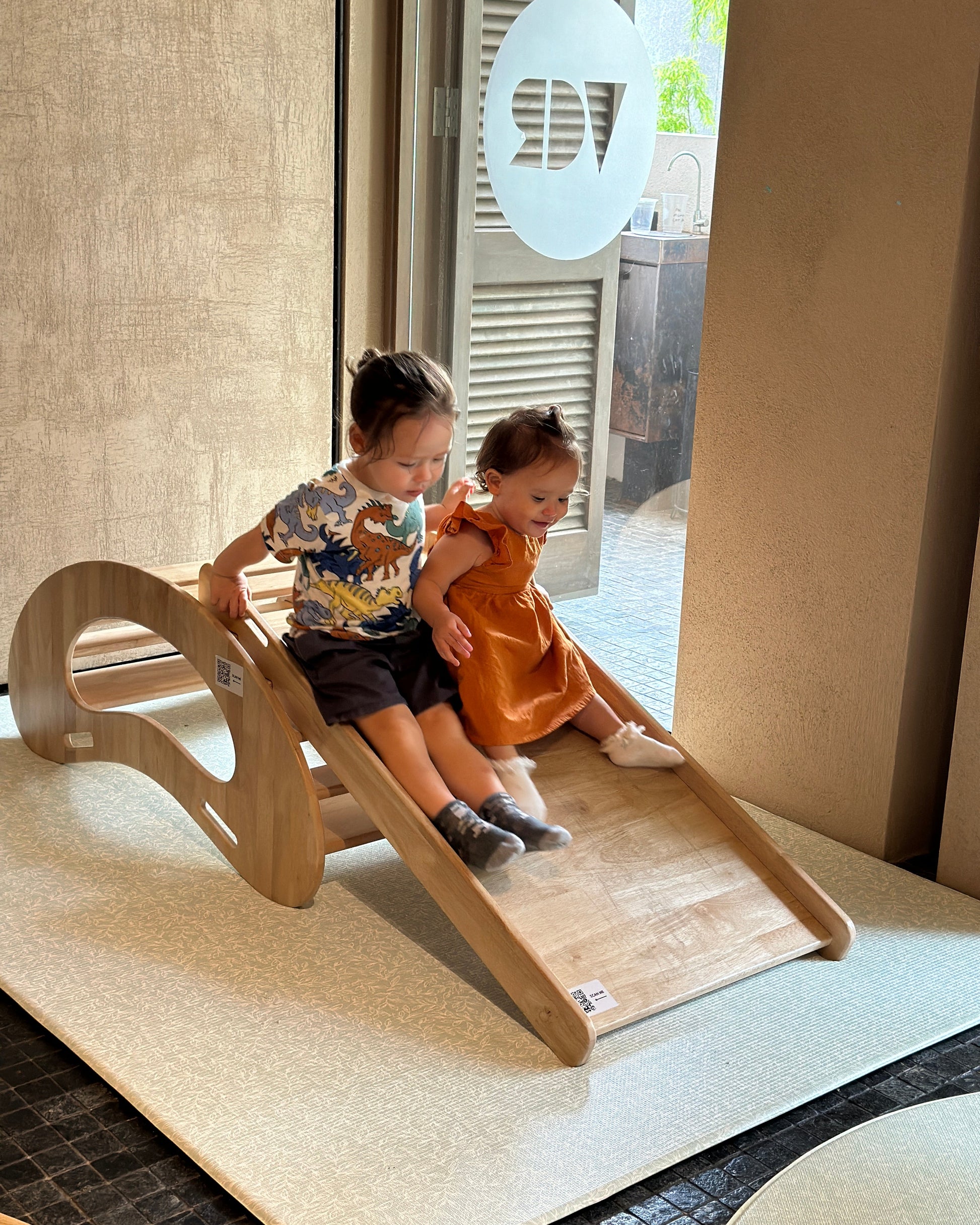 Children sliding on Tabur Arch & Slide Solid Wood Malaysia
